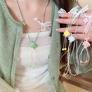 Pastoral Ceramic Small Fish Bow Pendant Sweater Necklace With Leather Cord For Sweet Vacation Style