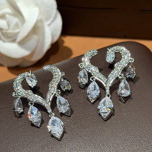 Light Luxury Copper Zircon Hollow Heart Tassel Drop Earrings With Silver Needle Princess Style