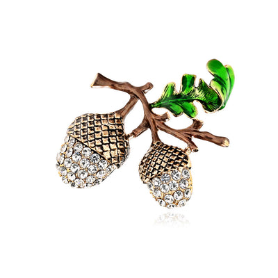 Front product view of the flower brooch pin in gold and green