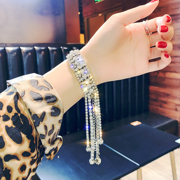 Silver Tone Rhinestone Tassel Bracelet With Two Crystal Patterns