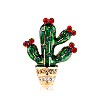 Front product view of the cactus brooch pin in green and gold