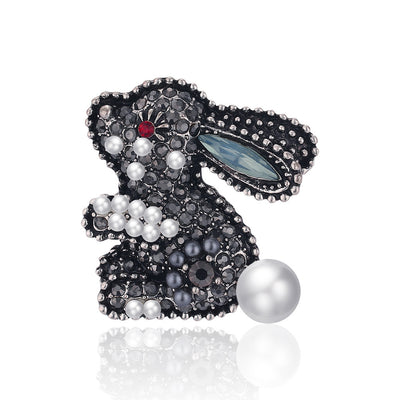 Front product view of the rabbit brooch pin in silver and black