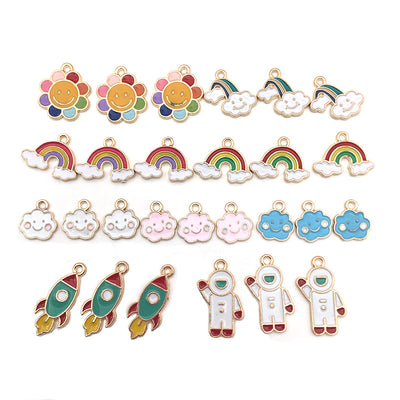 Colorful seashell charms arranged on a light background