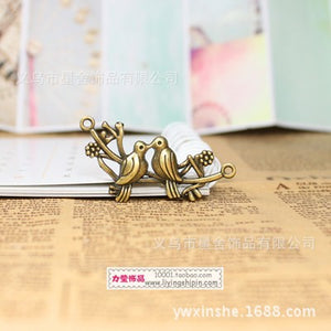 Two-Bird Branch Connector Charm In Three Metal Finishes