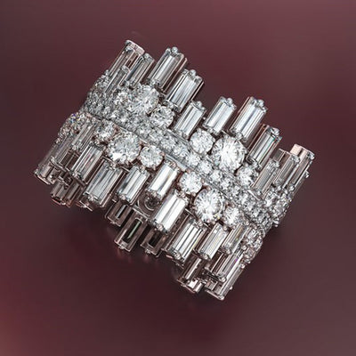 Wide clear baguette and round stone mosaic ring