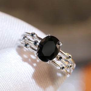 Black Oval Solitaire Multi-Rail Ring In Polished Silver Tone