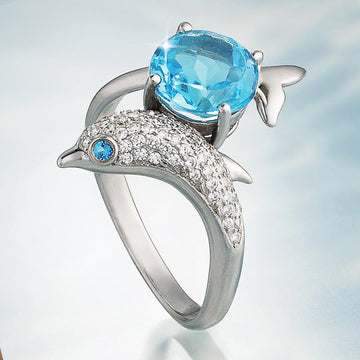 Blue Stone Dolphin Ring With Curved Silver Tone Band