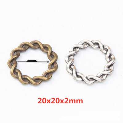Assorted braided round links arranged together on a white background