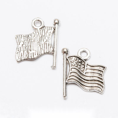 Flag On Pole metal charm displaying front and reverse sides