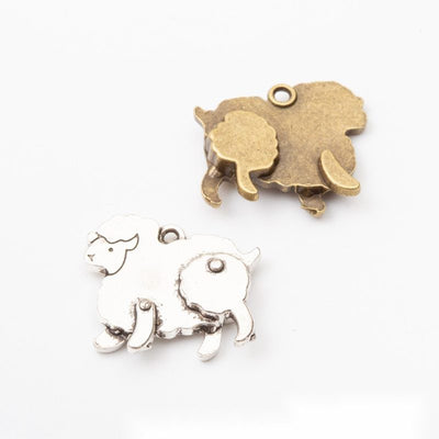 Sheep Charm Pendant finish comparison showing a rounded woolly body and small curled horn