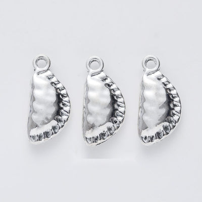 Group view of dumpling charm showing all 1 pictured finish variants