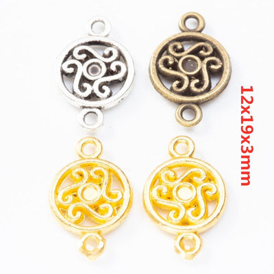 Round Swirl Double Loop Metal Connectors in Three Finishes in multiple metallic finishes displayed together on a white b