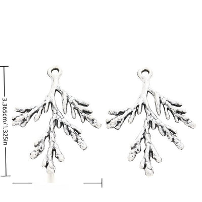 Branch Sprig metal charm displaying front and reverse sides