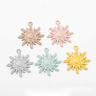Pastel Sun Face Metal Charm Pendant shown in the available visible finishes