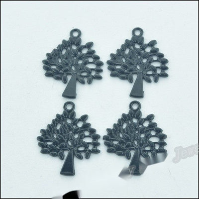 Group view of small openwork tree silhouette with a dark smooth coating