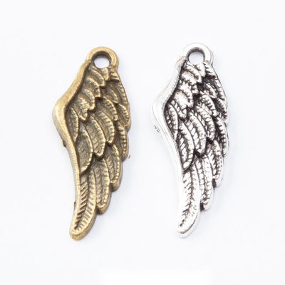 Front comparison of detailed single angel wing metal component in 2 finishes