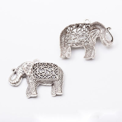 Patterned Elephant-Shaped Metal Charm Pendants shown in a grouped front view on a plain background