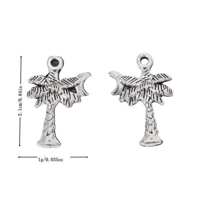 Antique Silver palm tree charm shown in an overview