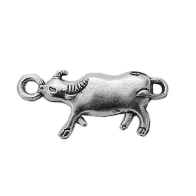 Front display of side-profile bull charm shown against a plain background.