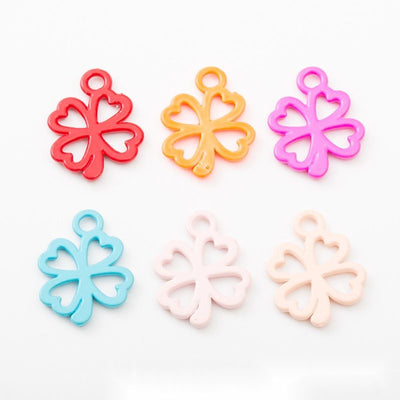 Group view of a smooth color coating covers an open four-leaf clover silhouette