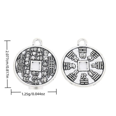 Front and reverse views of yin yang coin charms with measurement and weight guides
