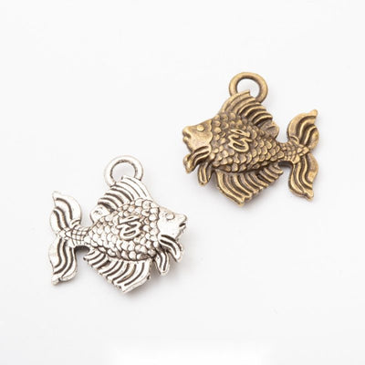 Detailed Goldfish metal design group view on a light background