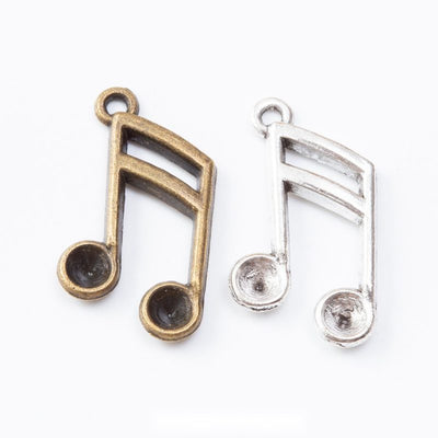 Double Music Note metal pieces shown in the available finishes.