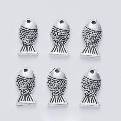 Scaly Fish metal piece showing overall shape and available finishes