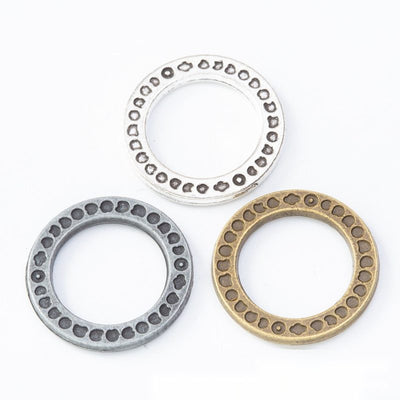 Grouped front views of dotted ring connectors