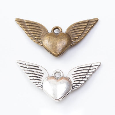 Winged Heart Textured Metal Charm Pendant shown in the available visible finishes