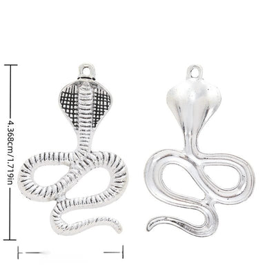 Cobra Snake metal charm displaying front and reverse sides