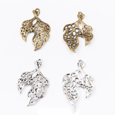 Filigree Leaves metal component, front grouping showing the available finishes.