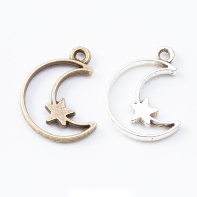 Open crescent moon frames containing a small star silhouette arranged together on a white background.