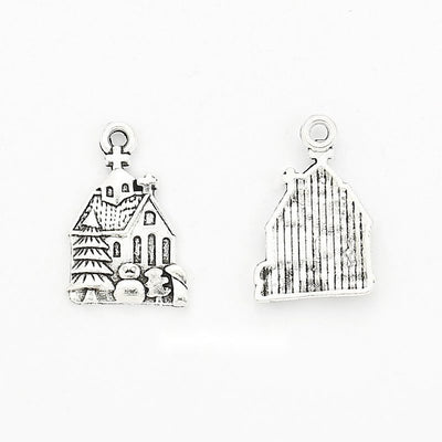 Group view of castle charm showing all 1 pictured finish variants