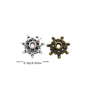 Ship Wheel Spacer Bead with a wheel-like rim with raised dots in 2 Metal Finishes