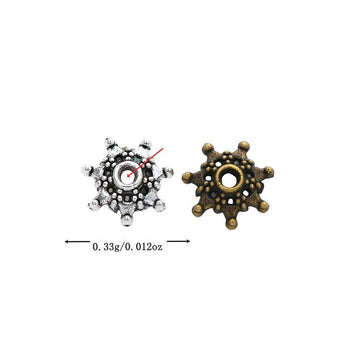 Ship Wheel Spacer Bead with a wheel-like rim with raised dots in 2 Metal Finishes