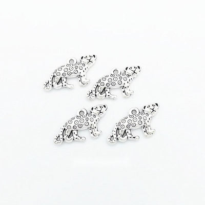 Tiny Running Leopard Charm shown in all pictured finishes on a white background