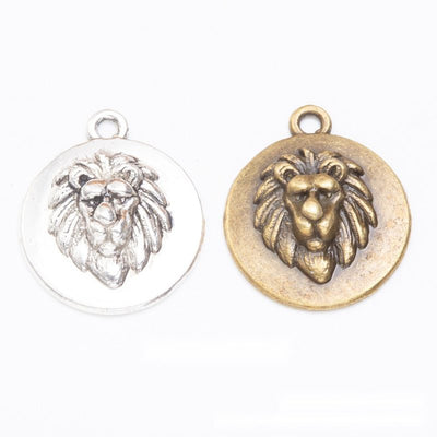 Lion head medallion charm shown across the available finishes