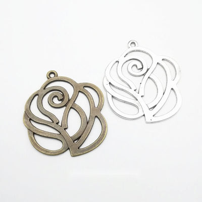 Open spiral rose with layered petal lines shown in the available finishes