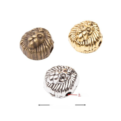 Finish comparison of 狮头穿孔 bead on a white background