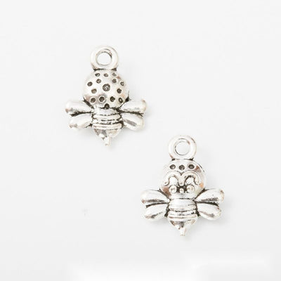 Group view of tiny bee styles on a white background