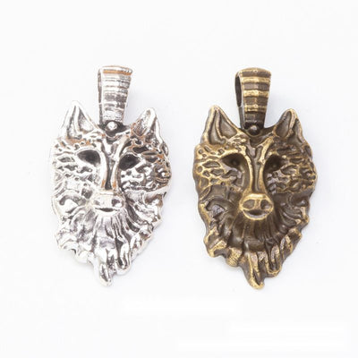 Product photo 1 of the wolf head bail charm highlighting its sculpted wolf face with a broad striped bail