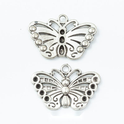 Group view of filigree butterfly styles on a white background