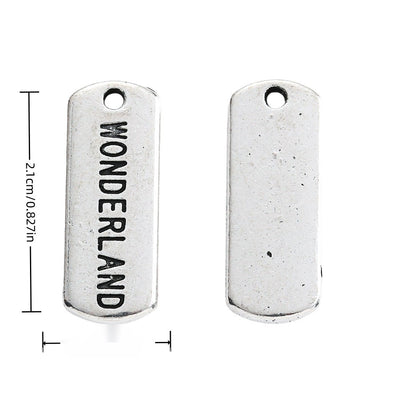 WONDERLAND Engraved Rectangular Tag Pendant Charm in Antique shown in front and back product view