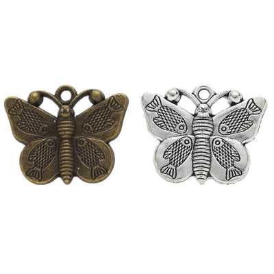 Embossed Broad Wing Butterfly Charm shown in all pictured finishes on a white background
