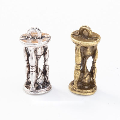 Hourglass metal piece shown in product image 1