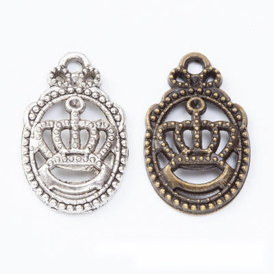 Crown emblem framed by a dotted oval border shown in the available finishes