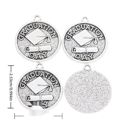 Graduation Day Medal metal charm displaying front and reverse sides