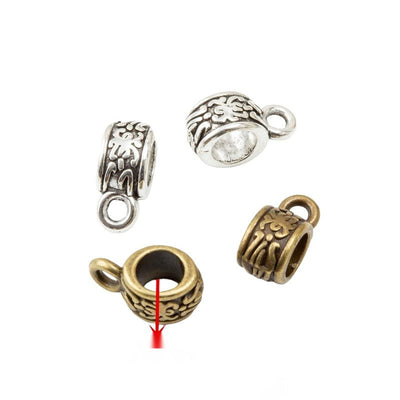 Front comparison of floral large-hole bail bead metal component in 2 finishes