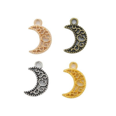 Grouped front view of crescent moon charm showing scrolling openwork and a top loop